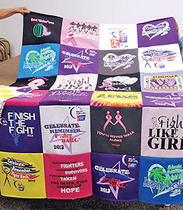 ONE OF the finished quilts made from donated cancer fundraiser T-shirts. The quilters waste no part of the T-shirts.