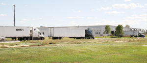 TRUCKS WERE waiting on a queue outside VanDyke’s Supply Monday, as workers loaded up the entire contents of three of the company’s divisions. Trucks arrived shortly after around 30 employees were told their jobs had been moved to North Carolina.