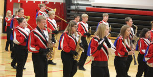 THE SCW band members, directed by Mr. Brett Kroeger, perform their “Shut Up and Dance” marching drill at their annual fall concert.