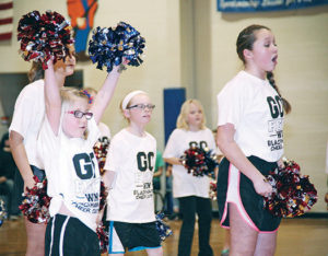 THE LITTLE Blackhawks cheerleading squad showed off their routine to a record crowd of basketball fans Monday night in Forestburg.