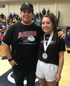 Woonsocket School Powerlifter Kyla Morgan placed first in the Class A division and third overall in the state Powerlifting Championship held at O’Gorman High School last weekend. She is pictured with her coach Armando Rodriguez.