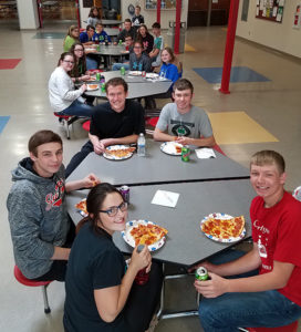 Pictured are the Woonsocket Reading Club members enjoying an end of year pizza party that was sponsored by the Friends of the Woonsocket Library.